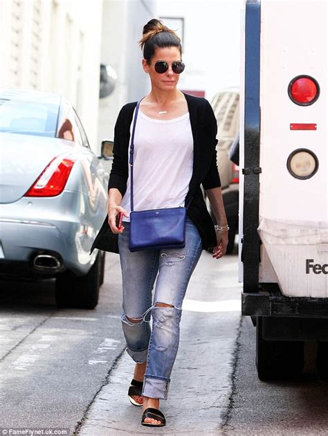 Sandra Bullock Rocks A Low Key Look In Baggy Ripped Jeans And Casual