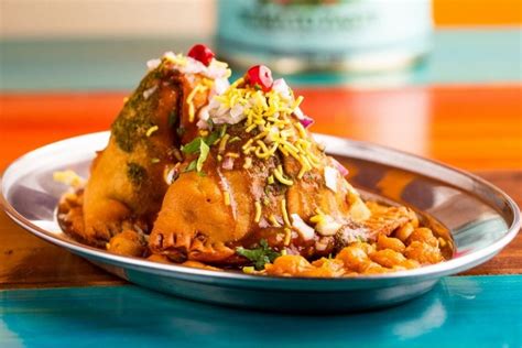 Samosa chaat is an excellent way to use up leftover samosas. Punjabi Samosa Chaat - Indico