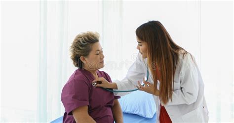 Doctor Explaining Medication To Old Woman Patient At Hospitals Stock Image Image Of Occupation