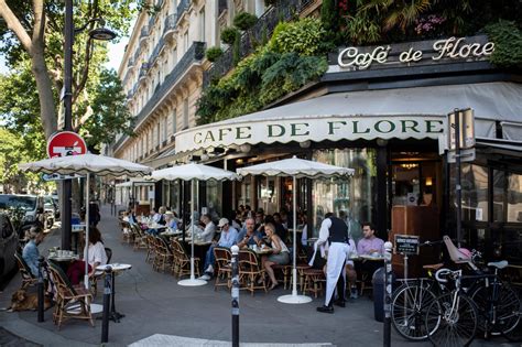 ‘back Where We Belong Parisians Bask In Sun As Cafés Reopen After