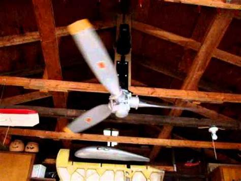 A ceiling fan made from a vintage hartzell airplane propeller and an electric wheelchair motor. Airplane Propeller Ceiling fan - YouTube