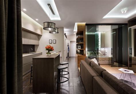 A community where many commuters live. Glass Doors Define The Bedroom In This Small Apartment ...