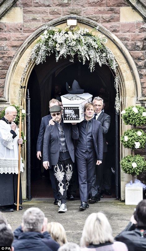 Boy George And Martin And Gary Kemp Carry Coffin At Steve Strange
