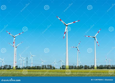 Modern Wind Turbines On A Sunny Day Stock Photo Image Of Generator