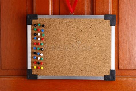 Cork Board With Colorful Push Pins Hanging By A Door Stock Image Image Of Push House 55451259