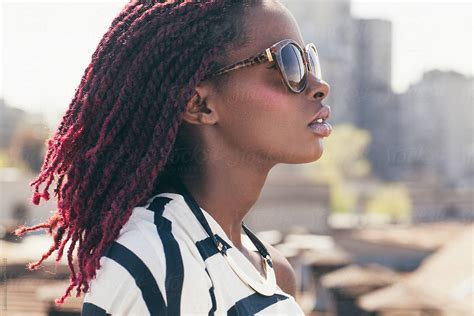 African Woman With Sunglasses And Pink Dreadlocks By Stocksy Contributor Lumina Stocksy