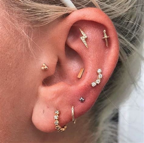 Ear Curation On Instagram Tragus Flat Upper Helix Conch Mid Helix And Triple Lobe
