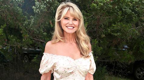 Christie Brinkley Rocks Strapless Swimsuit In The Ocean Hollywood Life