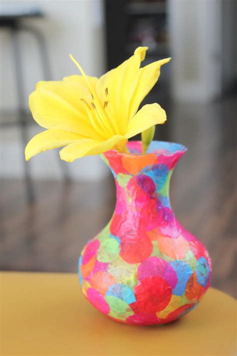 I used wax paper and part water part white glue. Easy Mod Podge Confetti Vase | Gluesticks