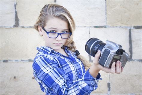 Girl Holding Camera Taking Self Portrait — Stock Photo © Annems 44966243