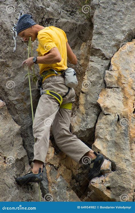 Young Male Climber Hanging By A Cliff Stock Photo Image Of Adventure