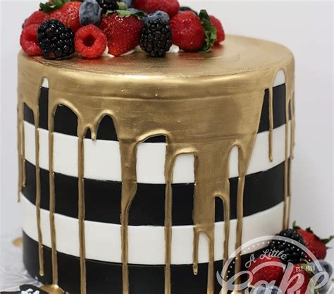 In medium saucepan over very low heat, melt chocolate chips and butter, stirring until smooth. Black And White Birthday Cake With Gold Drip