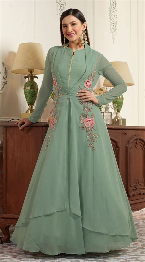 The simple anarkali gown suits usually have a minimal design. Buy Graceful Green Partywear Designer Embroidered Faux ...