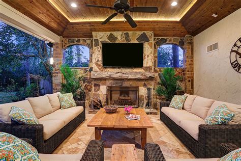 Rustic Outdoor Living Area With Stone Fireplace Patio Design Patio