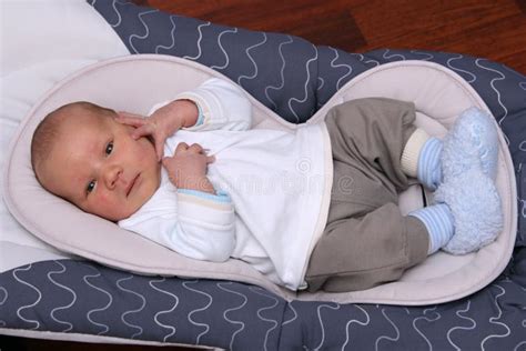 Newborn Baby Lying In Bouncer Chair Stock Image Image Of Hand