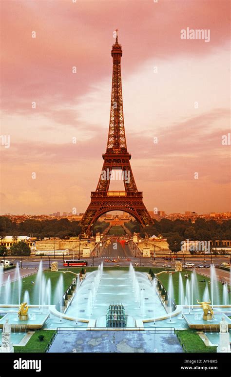 Eiffel Tower And Trocadero Gardens With Fountains In Paris At Sunset