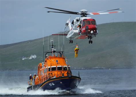 Crew From The Coastguard Helicopter Pictured On A Training Exercise