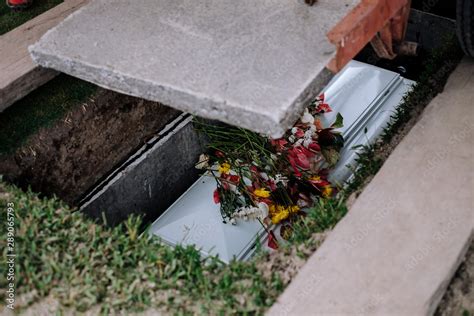 Cement Slab Was Lowered To Cover The Coffin Casket Of The Dead With