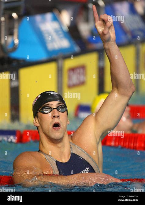 us swimmer michael phelps cheers winning the men s 200m freestyle of the 12th fina championships