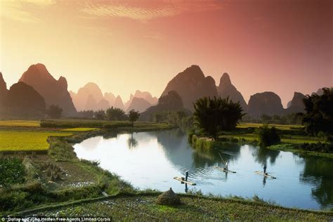 chinas guangxi zhuang region breathtaking pictures  fisherman   li river  sunset