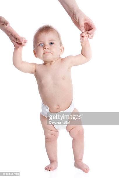 Baby Standing Up In Diaper Photos And Premium High Res Pictures Getty