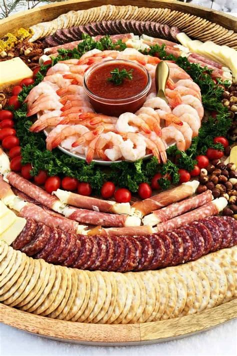 Shrimp can harbor bacteria that can potentially give you food poisoning. Try this Epic Shrimp Cocktail Charcuterie Board for Christmas or New Year gatherings! #holida ...