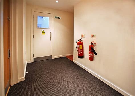 Fire Exit Sign Stock Photos Pictures And Royalty Free Images Istock