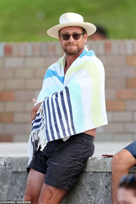 Simon Baker Shows Off His Abs As He Relaxes With Son Claude Blue