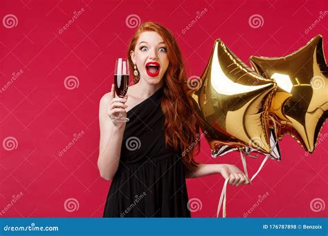 Portrait Of Excited Gorgeous And Wondered Surprised Redhead Woman Celebrating Birthday Or