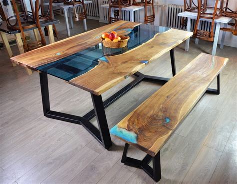 Simple, modern design meets rustic, natural style in this large rectangular live edge wood bench table handcrafted in india, the live edge wood table top is secured to wide, flat, black iron legs positioned in a stylish geometric pattern. Live edge river dining table with bench - Fine Wooden ...