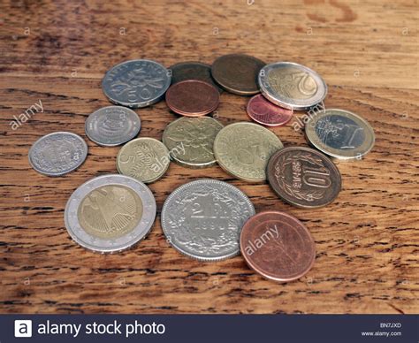 World Currencies Coins Of Different Countries Stock Photo Alamy