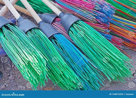 Colorful Plastic Brooms For Cleaning Stock Photo Image Of Indoors