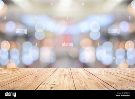 Wood Table Top Counter On Bright Bokeh Interior Background With White