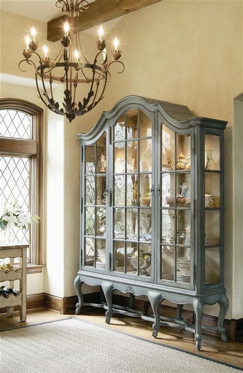 Use wire cutters to cut off the bottom of a wire hanger. 40+ AMAZING CHINA CABINET MAKEOVER IDEAS - Page 14 of 42