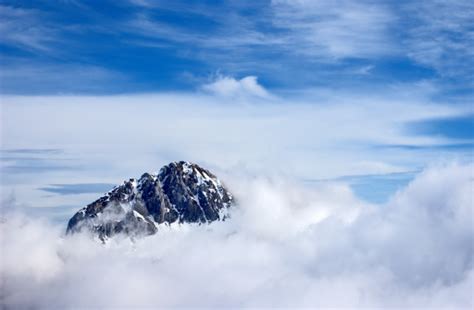 Mountain Peak Above The Clouds Stock Photo Download Image Now