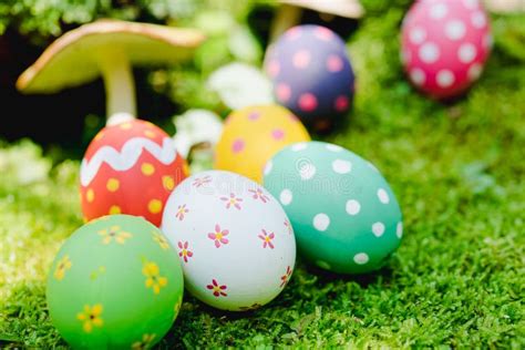 Beautiful Easter Multi Color Egg On Garden Green Grass Stock Photo