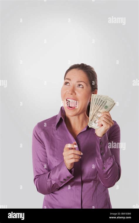Woman Holding Currency Notes Stock Photo Alamy