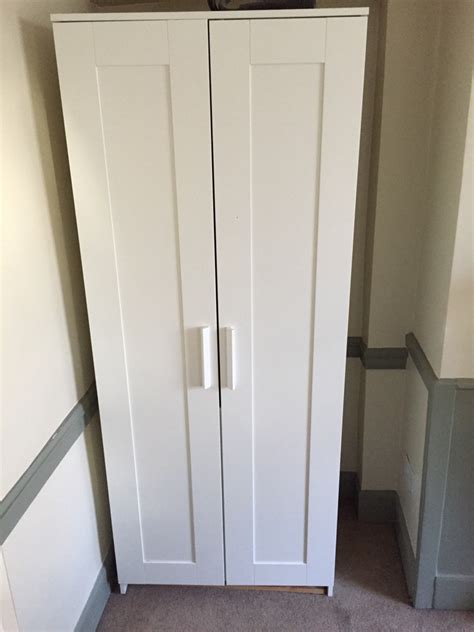 You save space with a mirror door, because you don't need a separate mirror. Assembled White Ikea Brimnes Wardrobe/Cupboard | Village