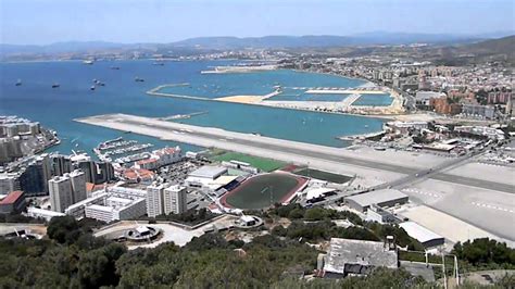The runways are located 13 hours away from atlanta, ga and from here the shortest possible connection is a 1 stop over flight. Gibraltar airport view from the rock (HD) - YouTube