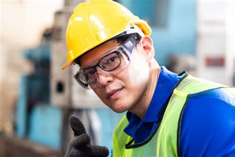 Portrait Asian Engineering Man In An Industrial Manufacturing Facility