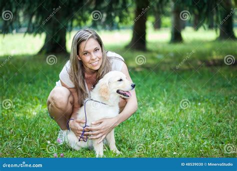 Smiling Girl Holding Her Dog Stock Photo Image Of Relax Relaxation