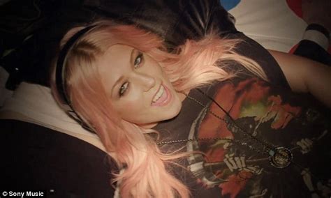 Amelia Lily Gets A Tattoo And Plays Drinking Games In New Video For