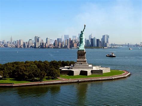 The statue of liberty is one of many landmarks that attract travelers to new york. Statue of Liberty A Monument In New York | Travel Featured
