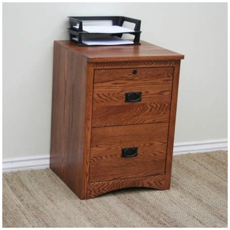 The file cabinet features a locking top drawer for security and accepts letter/legal sized files. Mission Oak 2-Drawer Letter File Cabinet by ODC - Stewart ...