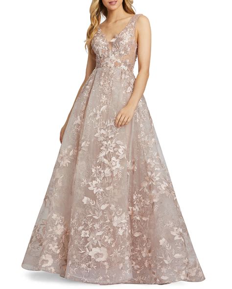 Details include a beaded high neckline and waistline belt, as well as lace. Mac Duggal Floral Embroidered Empire Illusion Ball Gown ...