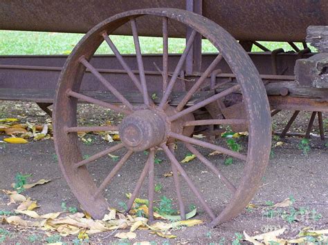 Antique Metal Wheel Photograph By Mary Deal