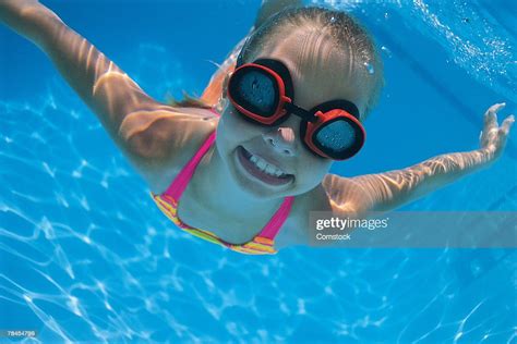 Girl With Goggles Swimming Underwater Photo Getty Images
