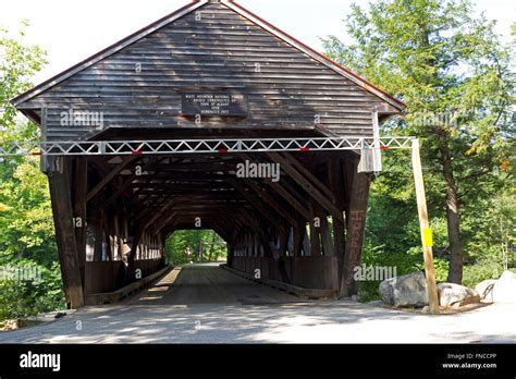 A Traditional Covered Bridge Over The Swift River Albany New