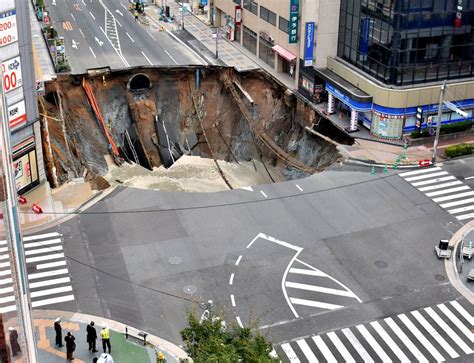 Massive Sinkhole Devours Japanese Street Fukuoka Photos Of The Week Japan