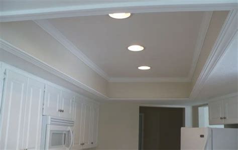 Today i'm showing you how to install pot lights in your kitchen ceiling! cherry plank tray kitchen ceiling | Kitchen lighting ...